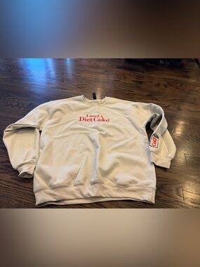 Gildan Cream Crewneck Sweatshirt with Red 'I Need a Diet Coke' Graphic
